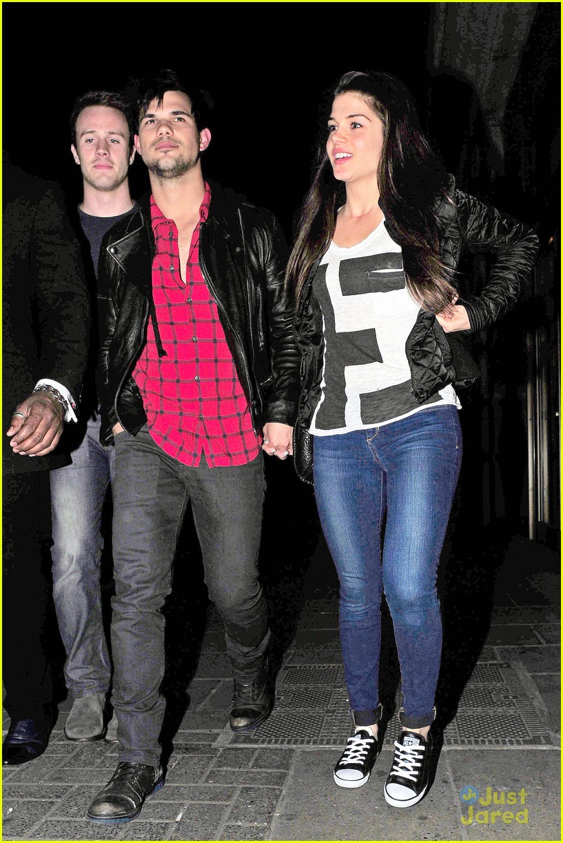 taylor lautner marie avgeropoulos matching jackets london 19